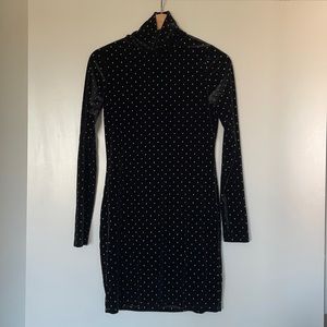 Black velvety dress with golden round studs